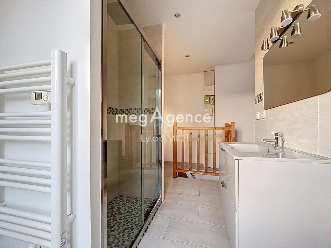 APPARTEMENT EN DUPLEX AVEC JARDIN PRIVATIF - Photo 5