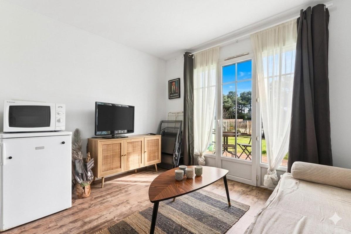 Appartement T2 proche Golfs,  offrant un cadre de vie privilégié et verdoyant au milieu des pins - Photo 3