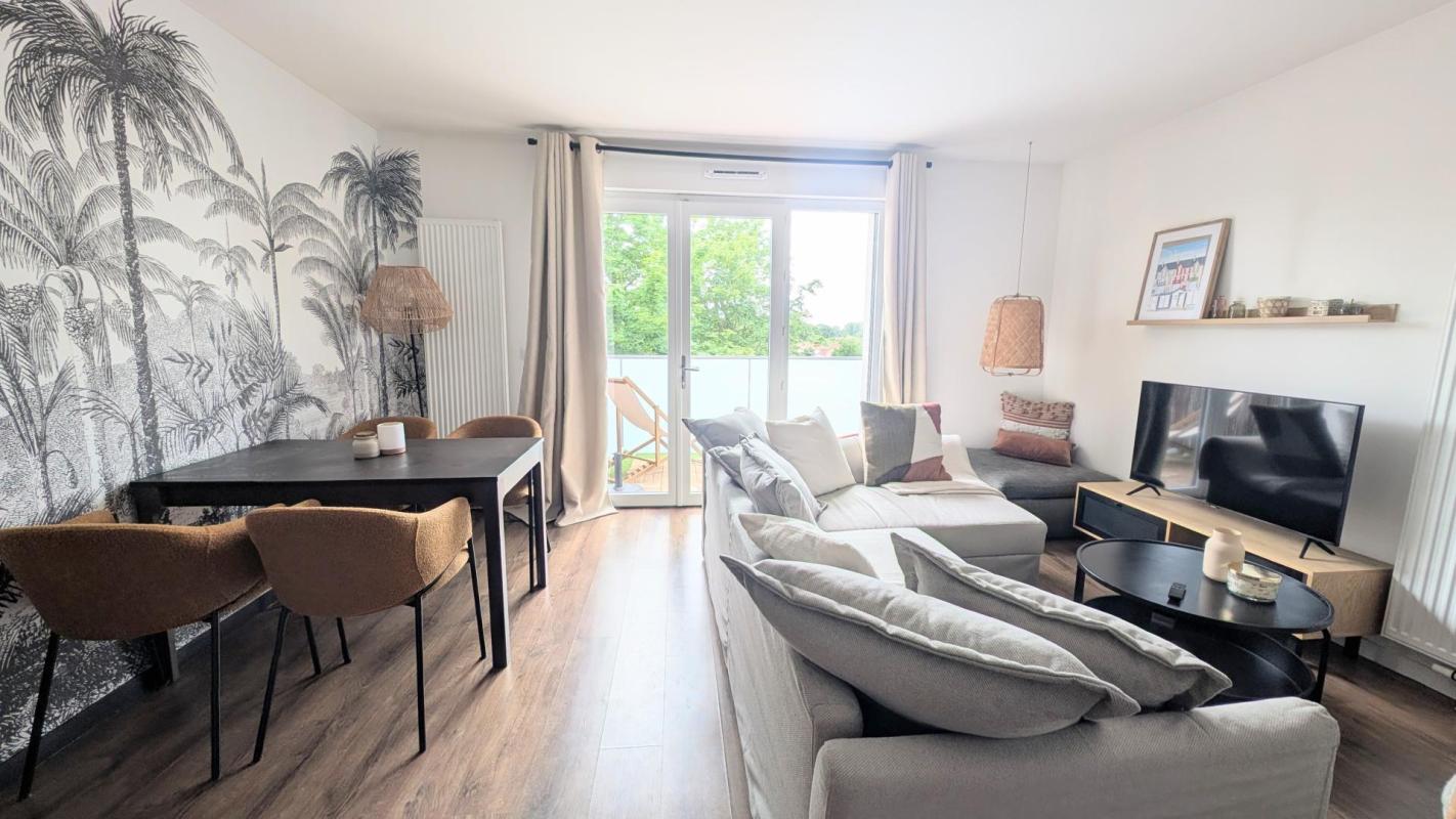 Coup de cœur assuré ! Appartement moderne avec balcon idéalement exposé et place de parking couverte - Photo 2