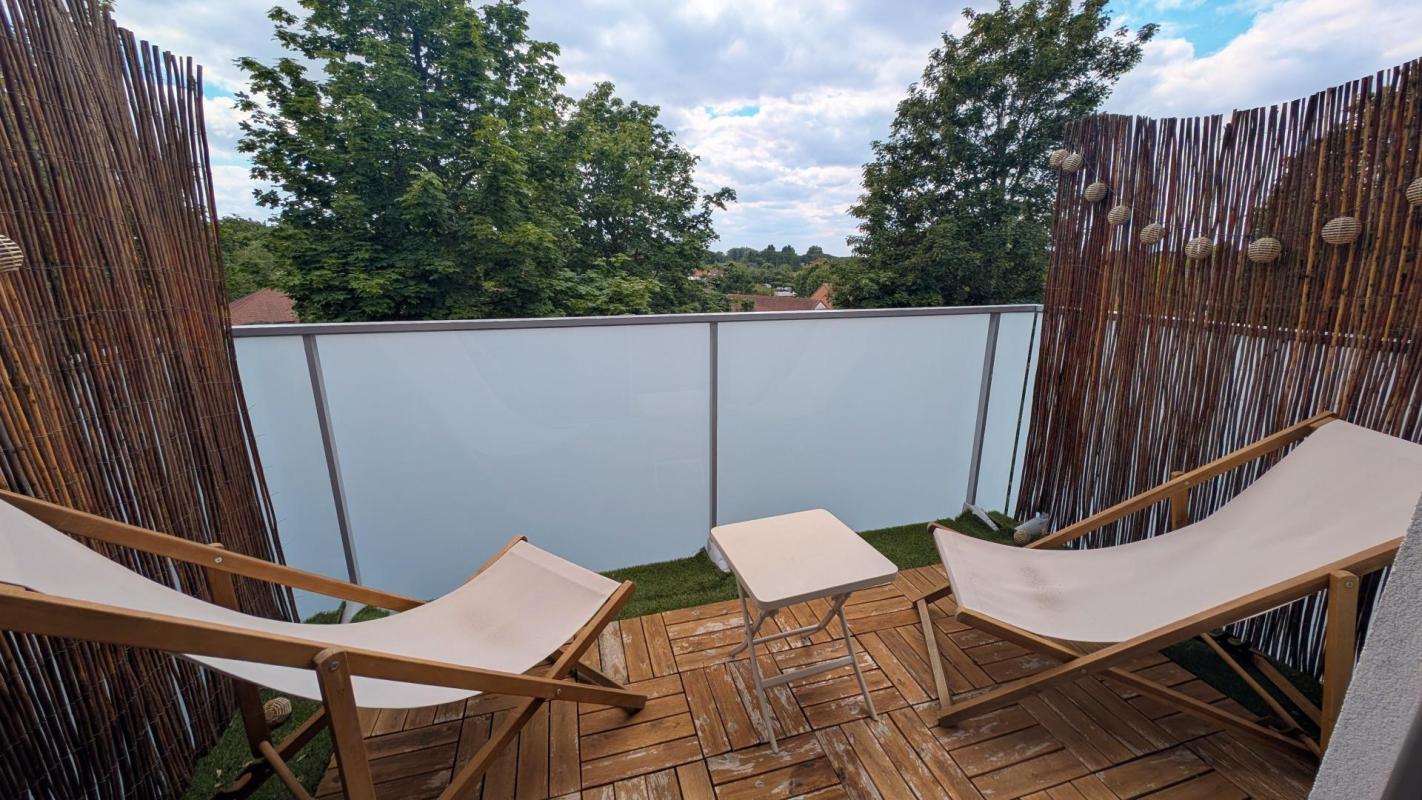 Coup de cœur assuré ! Appartement moderne avec balcon idéalement exposé et place de parking couverte - Photo 3
