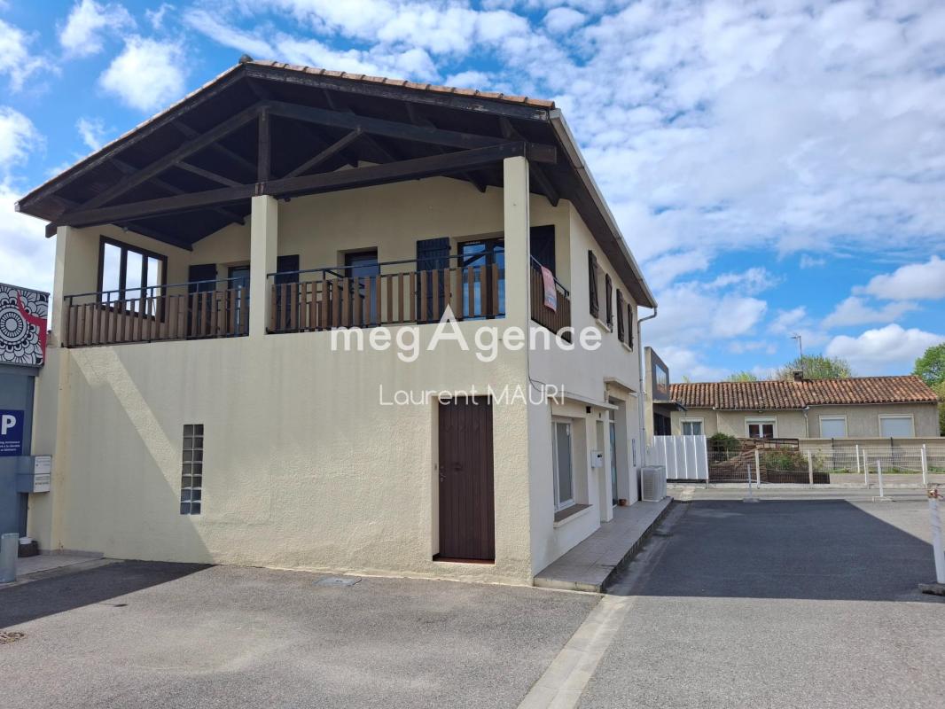 Immeuble comprenant 1 Appartement T3 avec terrasse environ 20m² + 2 Locaux Commerciaux - Photo 4
