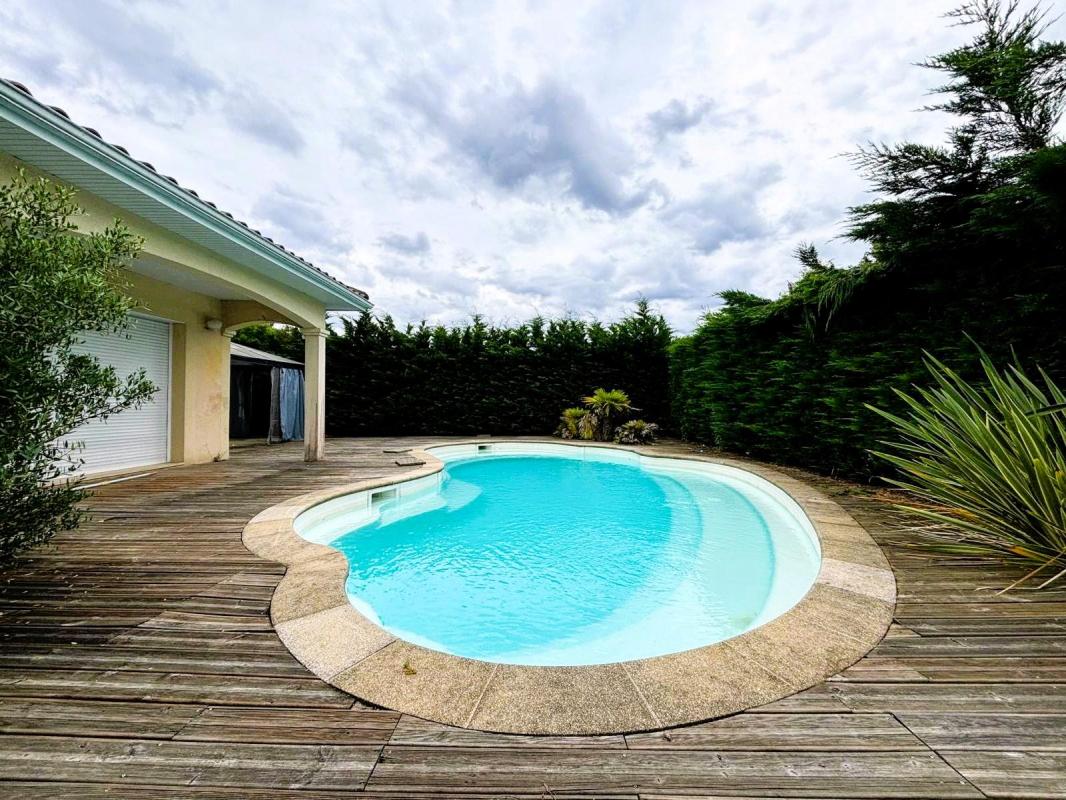 Maison individuelle à GUJAN-MESTRAS – 7 pièces avec dépendance, garage, jardin, piscine et terrasse - Photo 3