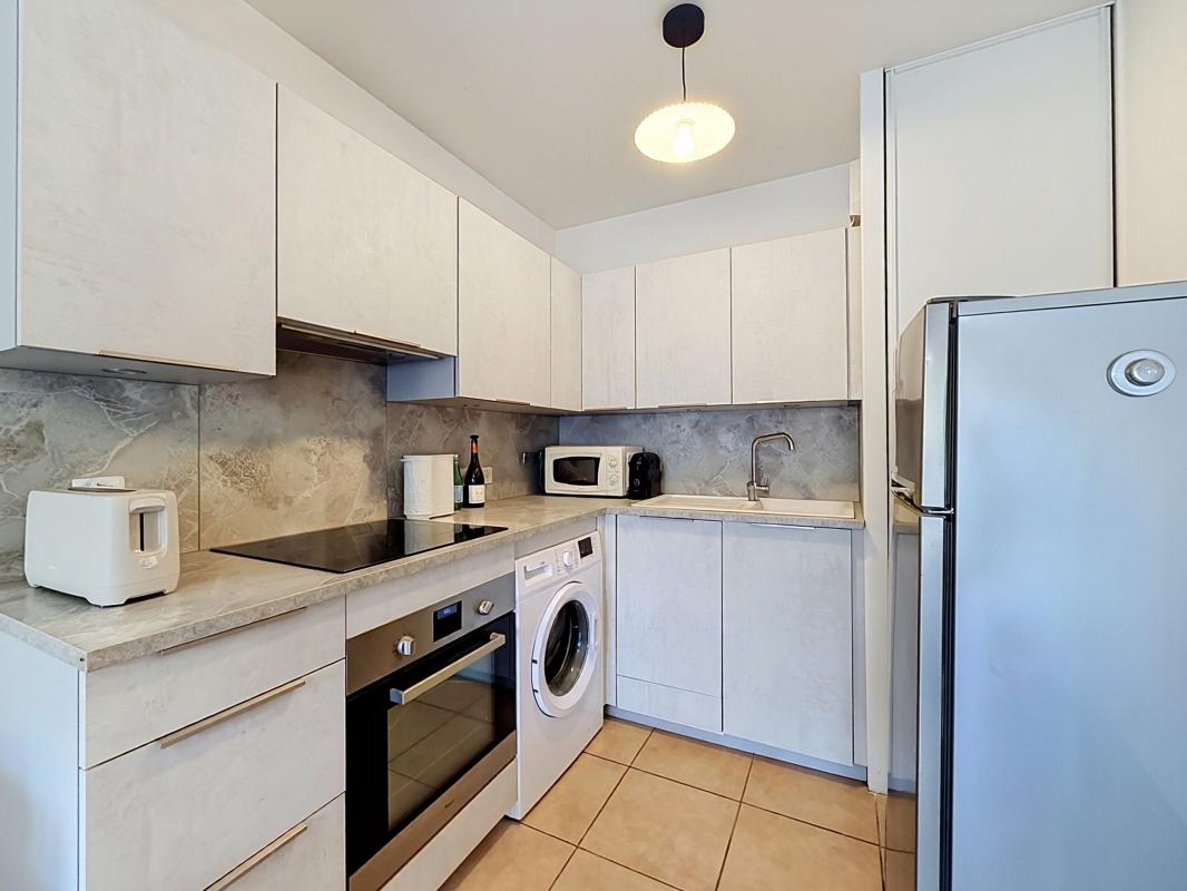 T2 30,51 m² avec terrasse, jardin et parking