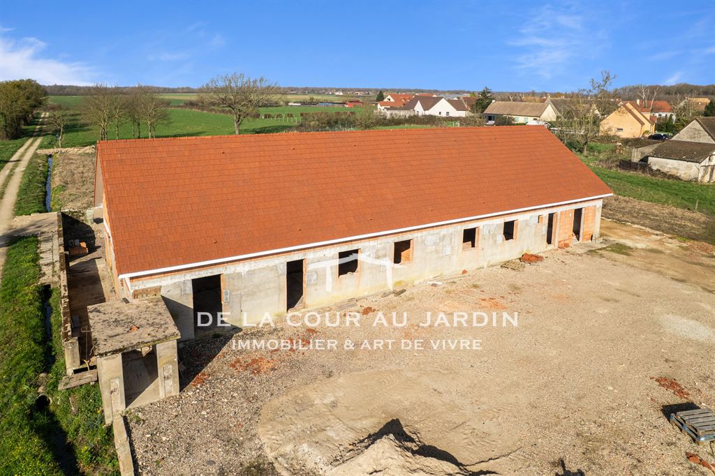Maison mitoyenne à rénover – Projet sur mesure avec permis de construire accordé