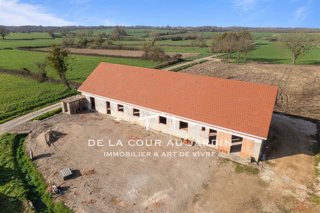 Maison mitoyenne à rénover – Projet sur mesure avec permis de construire accordé