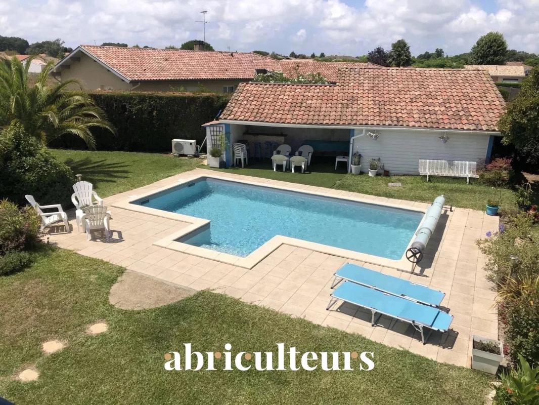 Belle maison Landaise 5 pièces -Terrain arboré -1788m2 - Piscine - Photo 4