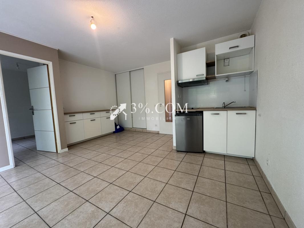 3%.COM Appartement  F2  avec terrasse et parking - Photo 4