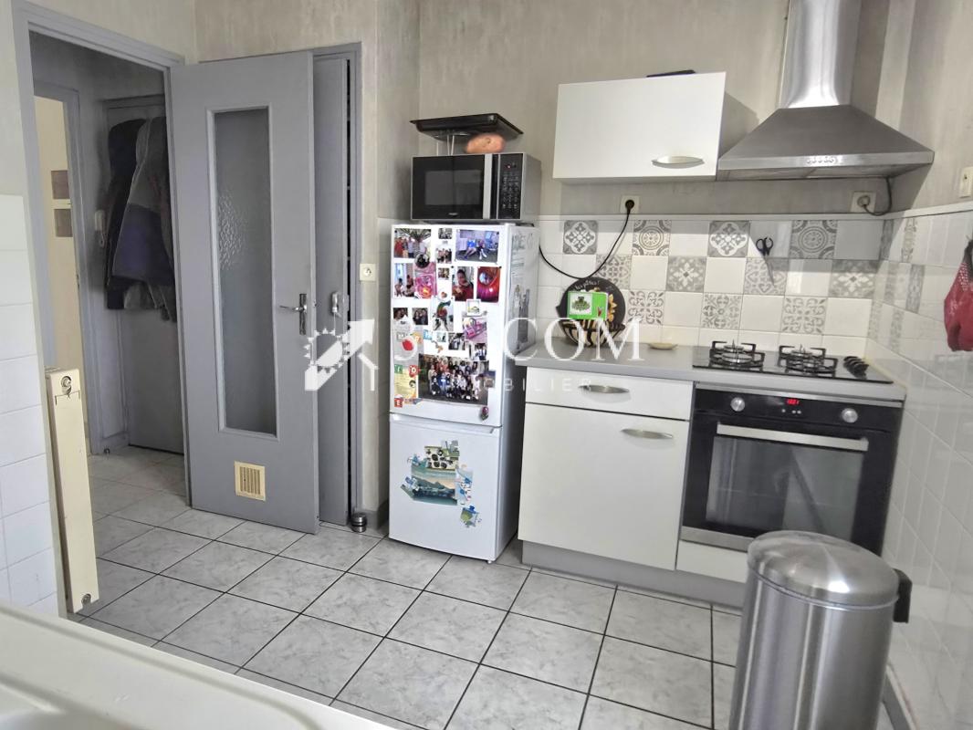 Appartement T4 de 68 m2 avec balcon et cave - Photo 4