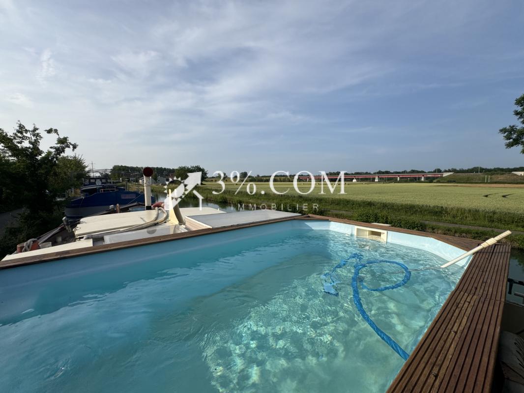 3%COM Péniche d'habitation  avec spa et piscine située à Eck - Photo 5