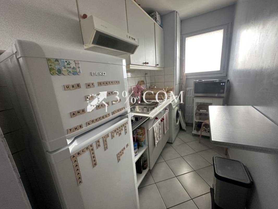 APPARTEMENT 40 M2 - BALCON - CAVE - PLACE DE PARKING - Photo 3