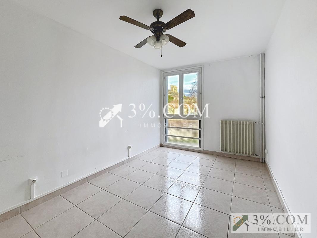 Appartement T3 avec balcon et cave - Photo 5