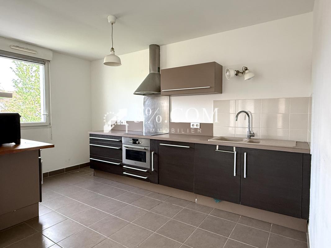 APPARTEMENT DE 61 M2 2 CH + EXT + PARKING - Photo 4