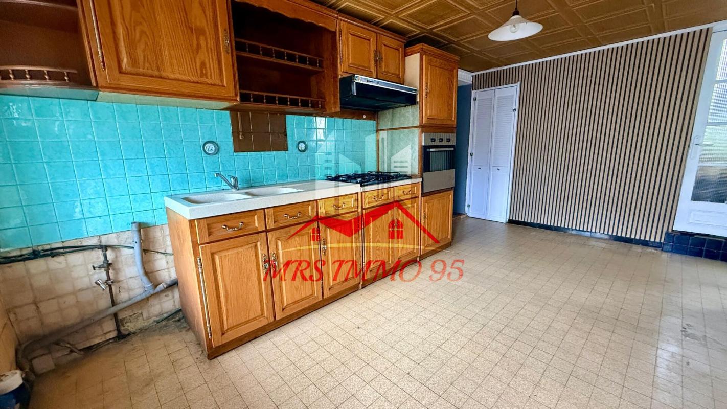 Maison triplex avec garage et terrasse