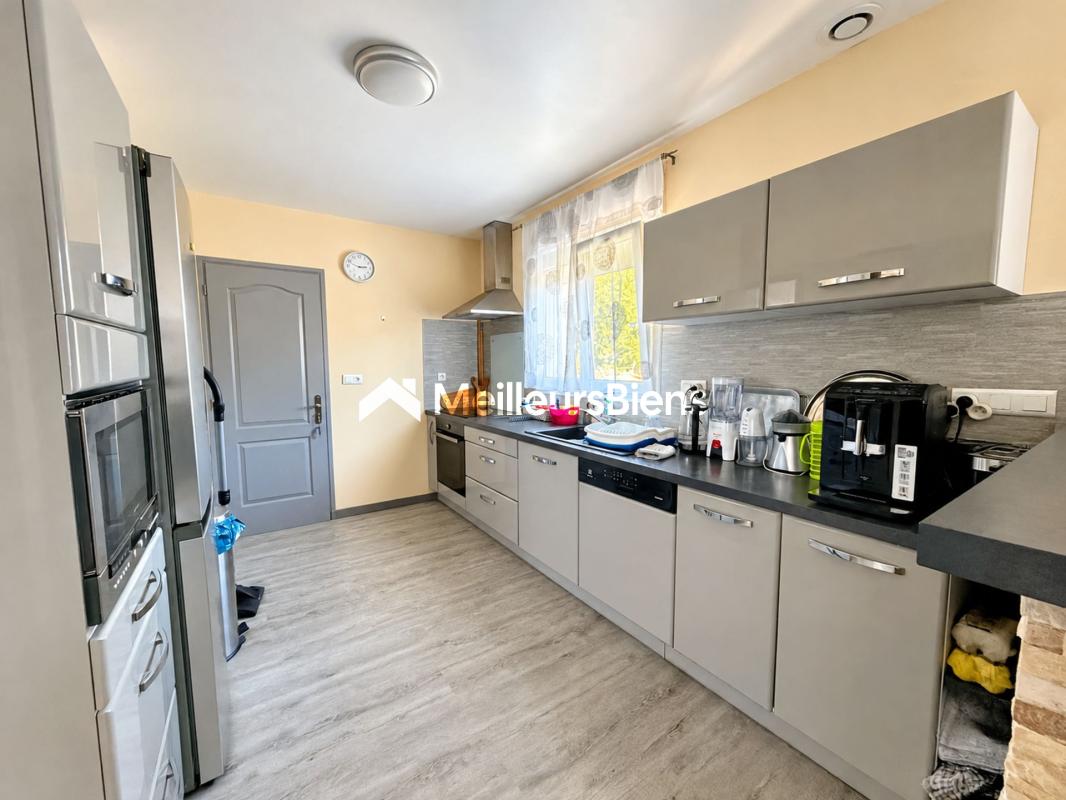 LOUVERNE - Pavillon 3 chambres et bureau sur terrain de 495 m²