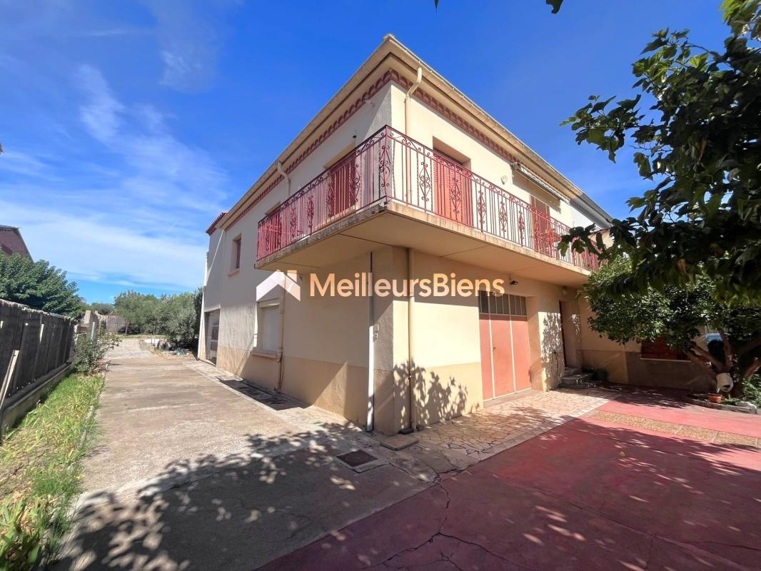 Maison 3 faces 108 m² + 108m² de garage sur 2200m² de terrain