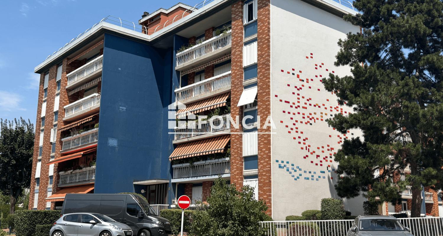 Appartement familial avec balcon ,cave et parking