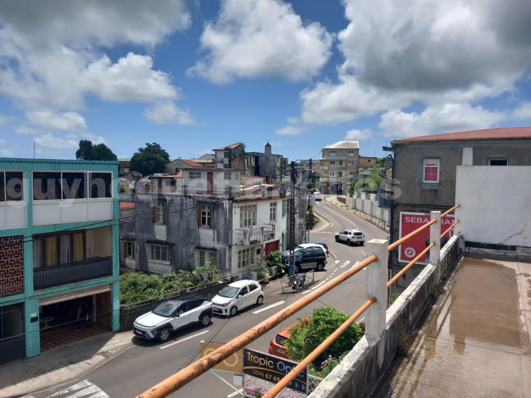 A VENDRE IMMEUBLE R+1 sur 922 m² de terrain